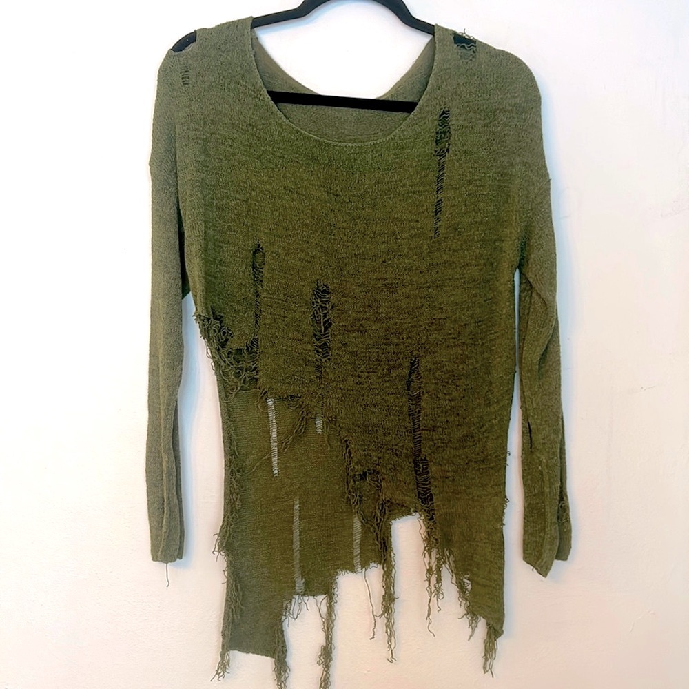 Deconstructed tattered and ragged zombie apocalypse asymmetrical sweater